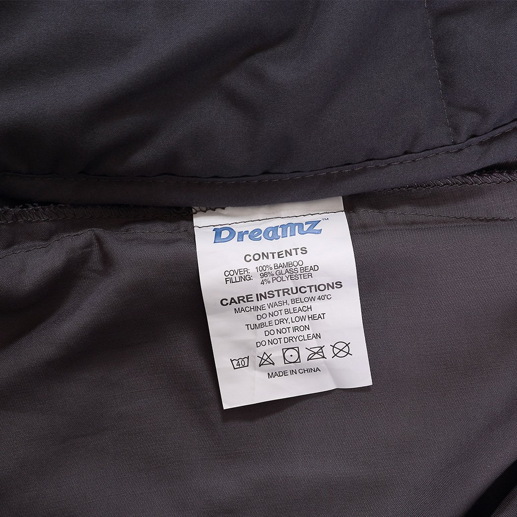 DreamZ 9KG Weighted Blanket in dark grey with a bamboo cover, showcasing its 5-layer design and removable zipped cover.